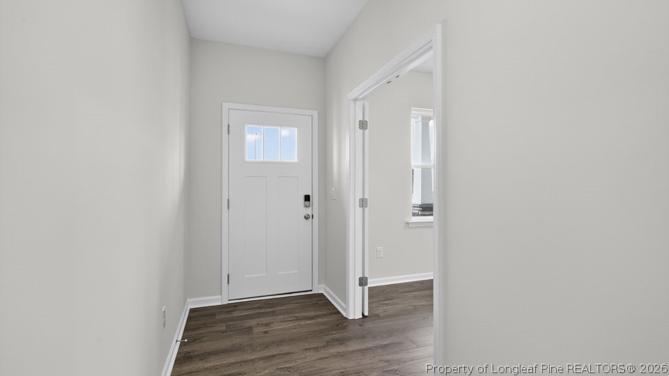 194 Fair Child Road Spring Lake, NC 28390 - Photo 2 of 33 a view of an empty room with wooden floor