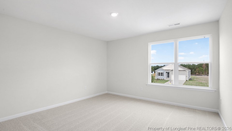 194 Fair Child Road Spring Lake, NC 28390 - Photo 22 of 33 an empty room with windows