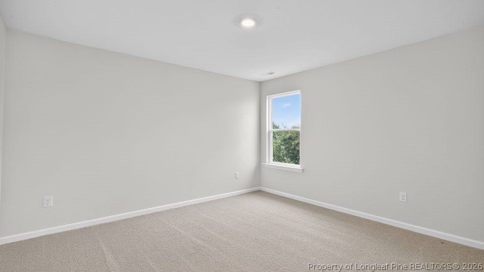 194 Fair Child Road Spring Lake, NC 28390 - Photo 24 of 33 an empty room with windows