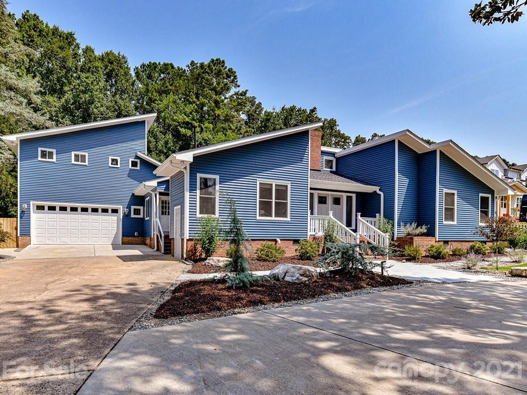 305 Boyce Road Charlotte, NC 28211 - Photo 3 of 48 a front view of a house with a yard