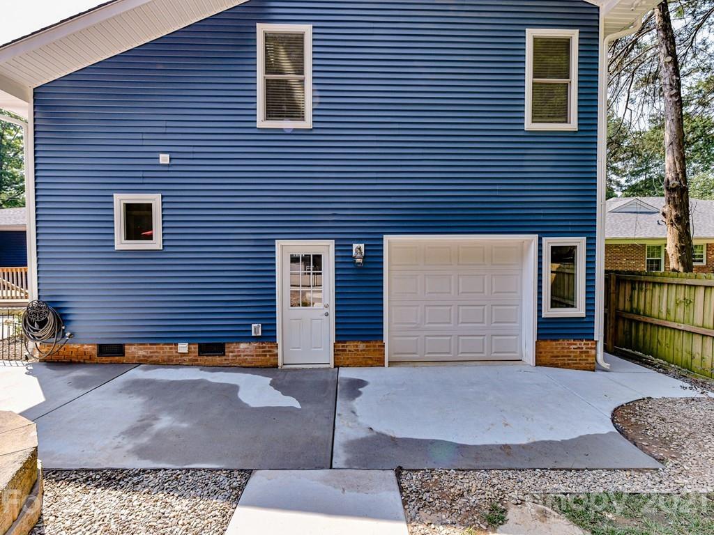 305 Boyce Road Charlotte, NC 28211 - Photo 39 of 48 a view of a house with a garage