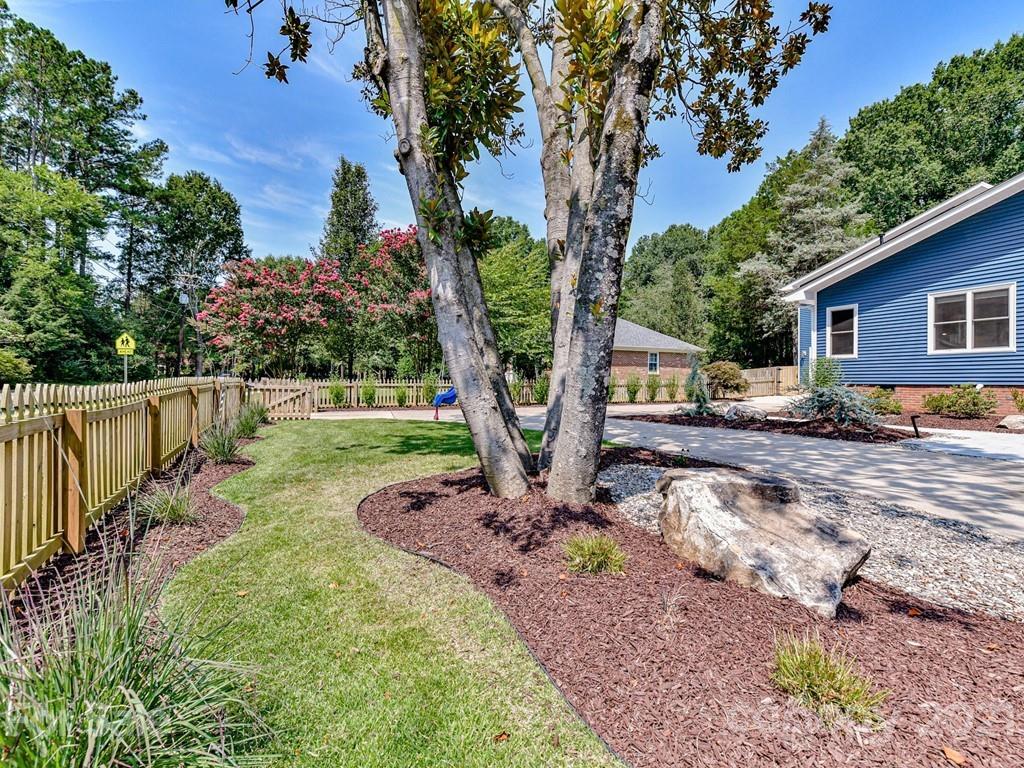 305 Boyce Road Charlotte, NC 28211 - Photo 46 of 48 a backyard of a house with barbeque oven
