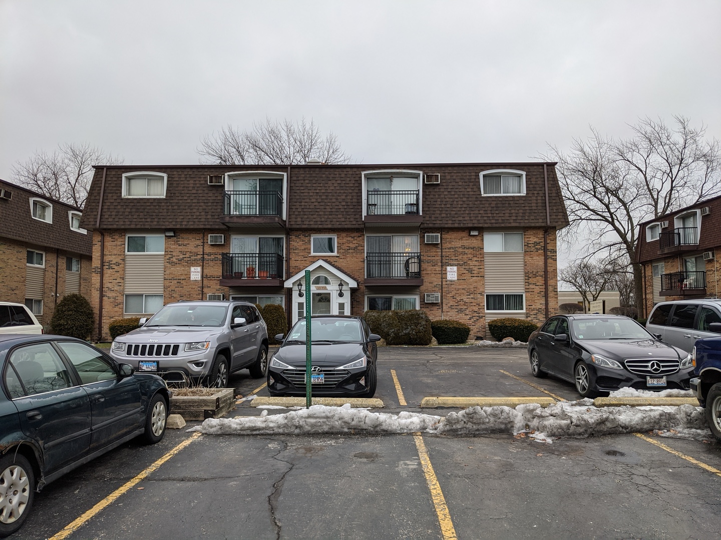 10440 South Ridgeland Avenue, Unit 5 Chicago Ridge, IL 60415 - Photo 3 of 27 a front view of a house with parking space
