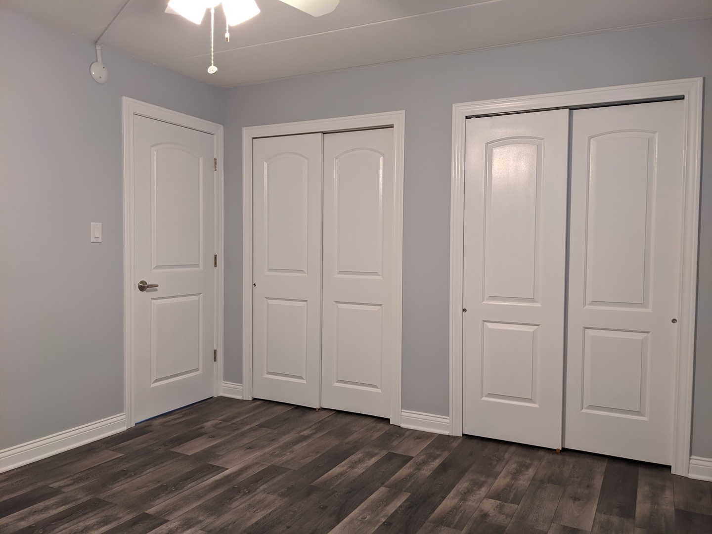 10440 South Ridgeland Avenue, Unit 5 Chicago Ridge, IL 60415 - Photo 24 of 27 a view of an empty room with wooden floor