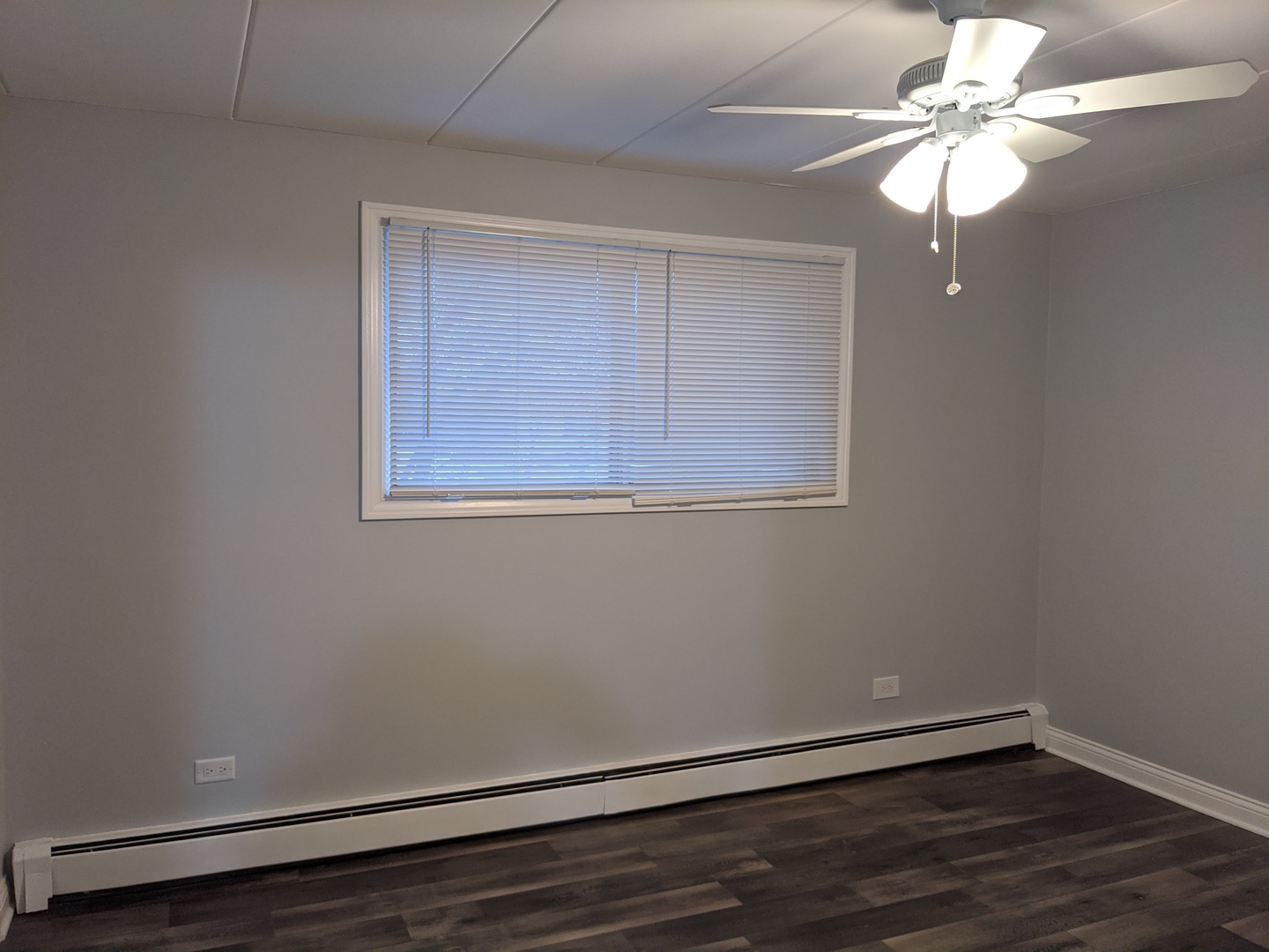 10440 South Ridgeland Avenue, Unit 5 Chicago Ridge, IL 60415 - Photo 26 of 27 a view of a small space with wooden floor and a window