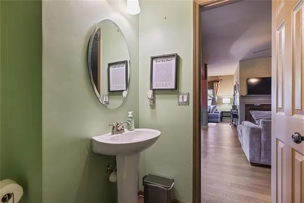 a large bed sitting in a bedroom next to a window