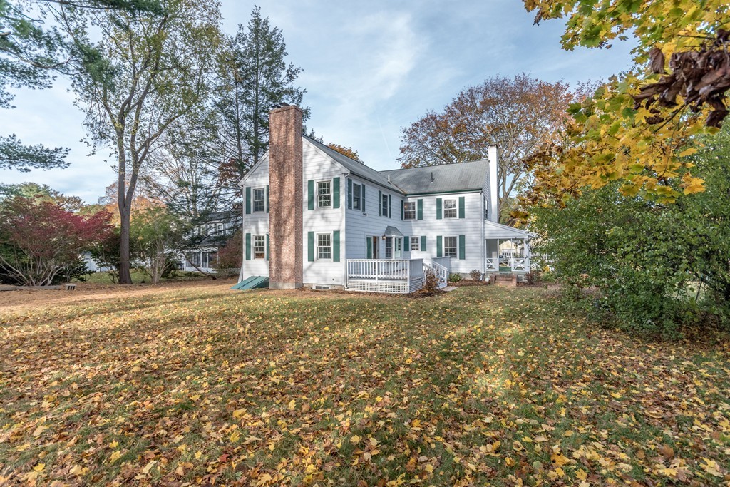 10 Fuller Road Needham, MA 02492 - Photo 2 of 10 a front view of a house with a garden