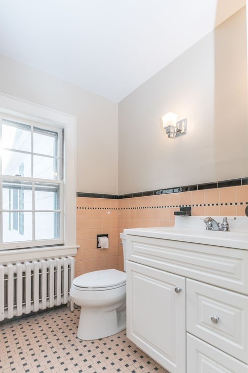 10 Fuller Road Needham, MA 02492 - Photo 8 of 10 a bathroom with a sink a toilet and window