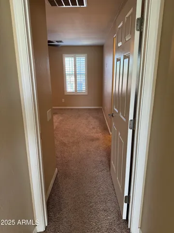 a view of a room with an empty space