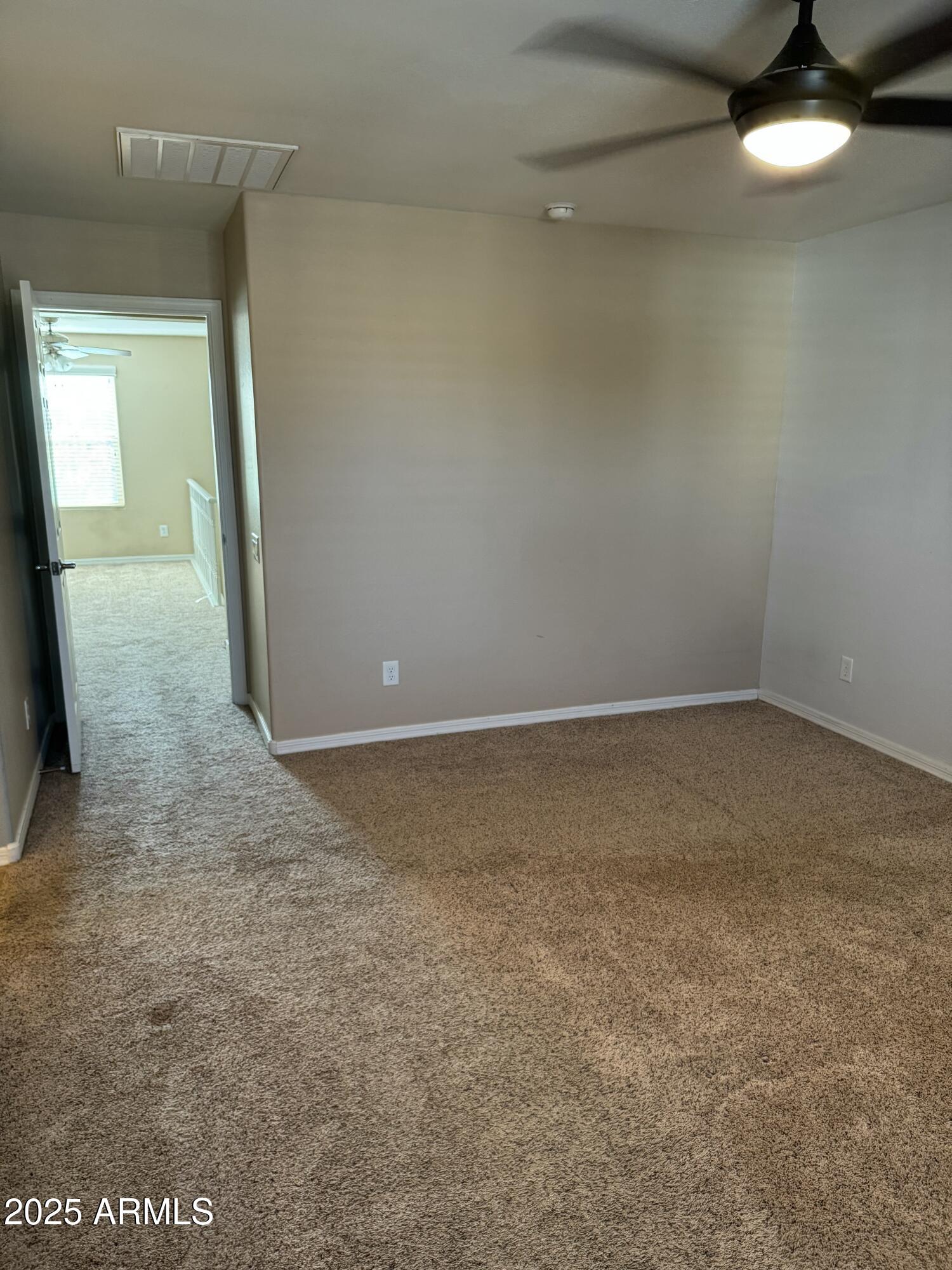 11009 East Sutter Avenue Mesa, AZ 85212 - Photo 18 of 32 a view of a room with an empty space