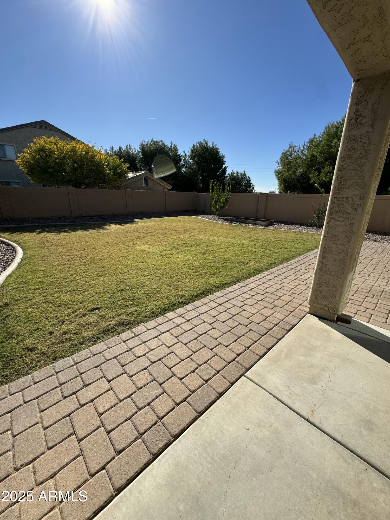 11009 East Sutter Avenue Mesa, AZ 85212 - Photo 30 of 32 a view of a yard and an ocean view