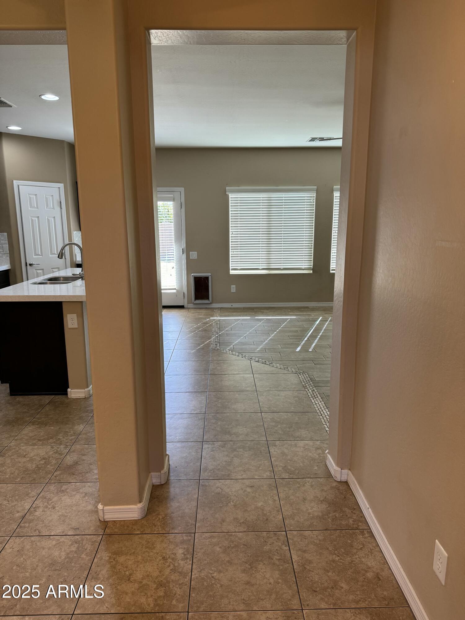 11009 East Sutter Avenue Mesa, AZ 85212 - Photo 3 of 32 a view of an entryway door
