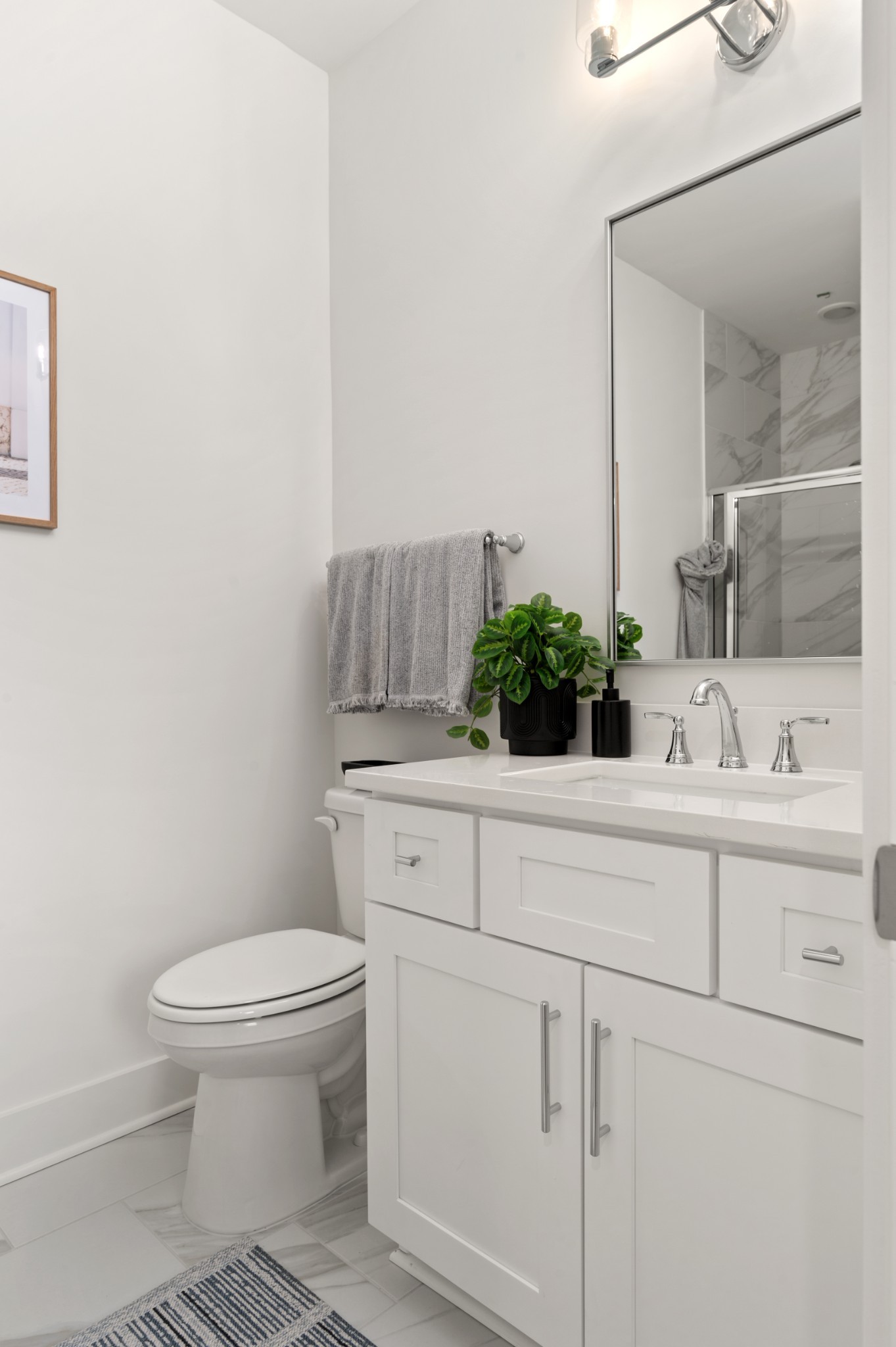 318 Mulberry Terrace, Unit B Madison, TN 37115 - Photo 20 of 33 a bathroom with a sink a toilet and mirror