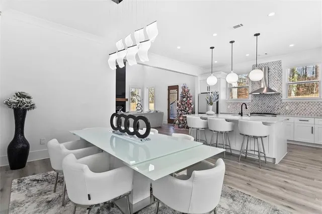 a bed room with a bed and a night stand