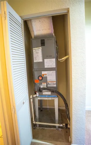 a utility room with washer and dryer