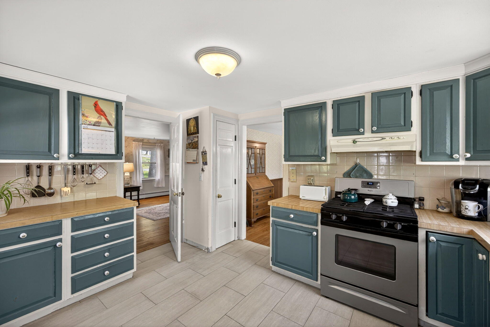 23 Nickerson Road Orleans, MA 02653 - Photo 2 of 54 a kitchen with a stove a sink and a cabinets
