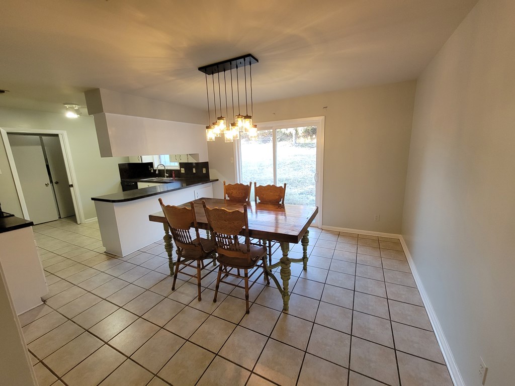109 7th Street Ingram, TX 78025 - Photo 4 of 15 a view of a dining room with furniture