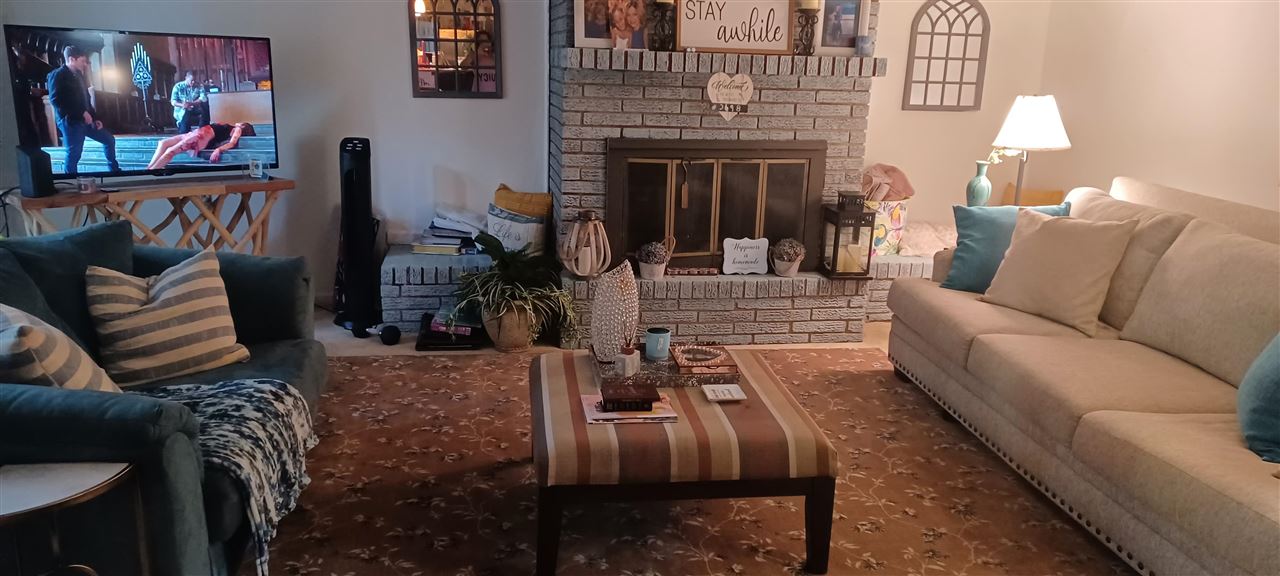 2920 Invergarry Road Memphis, TN 38128 - Photo 2 of 18 a living room with furniture and a fireplace