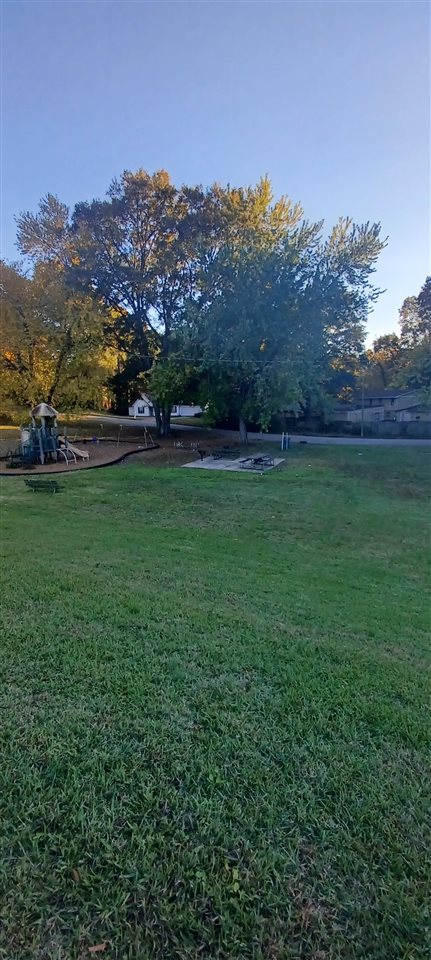 2920 Invergarry Road Memphis, TN 38128 - Photo 10 of 18 a view of a grassy field with mountains in the background