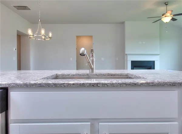 a view of a kitchen counter top space and kitchen view