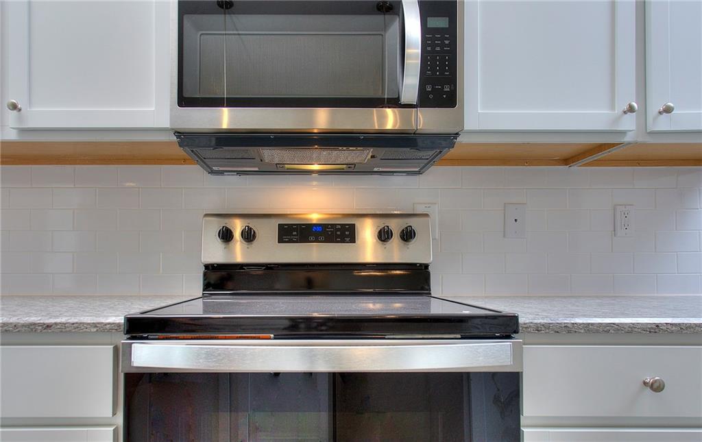 139 Swallowtail Lane Homer, GA 30547 - Photo 15 of 33 a stove top oven sitting inside of a kitchen