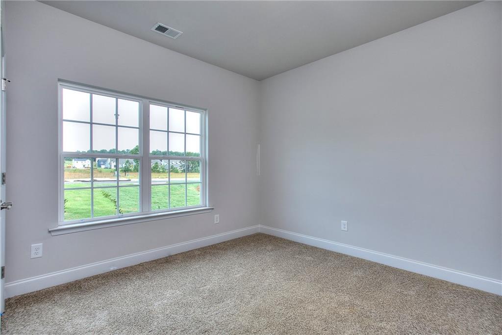 139 Swallowtail Lane Homer, GA 30547 - Photo 25 of 33 an empty room with a window