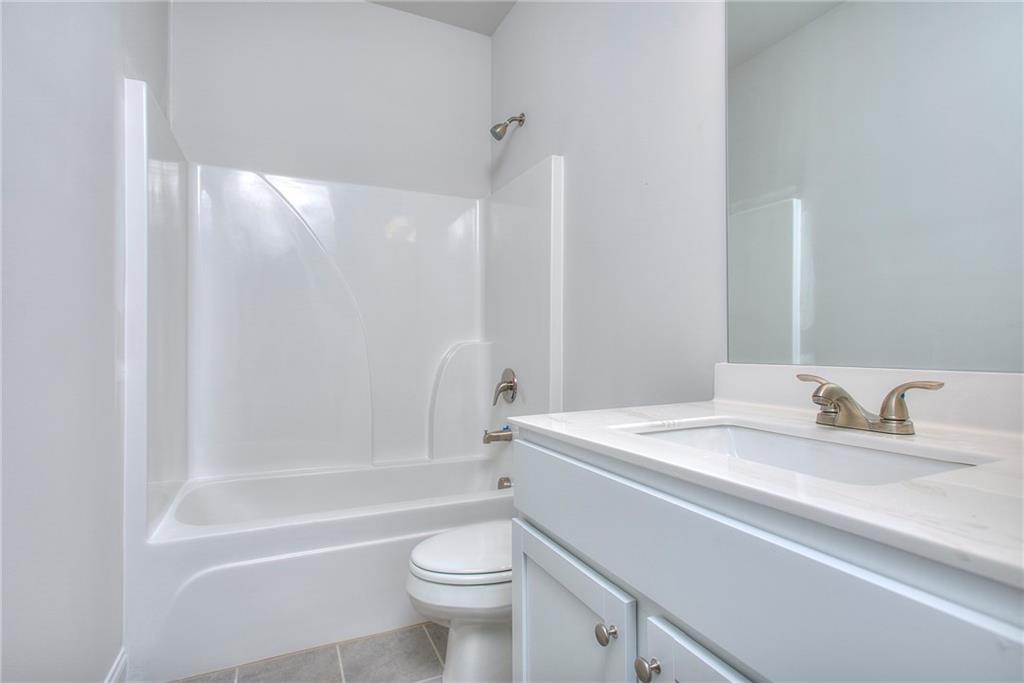 139 Swallowtail Lane Homer, GA 30547 - Photo 28 of 33 a bathroom with a sink toilet and shower