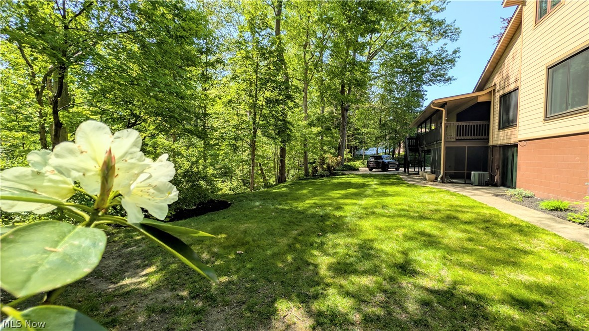 6409 Old Woods Road Ashtabula, OH 44004 - Photo 34 of 43 Manicured lawn with mature trees and established landscaping