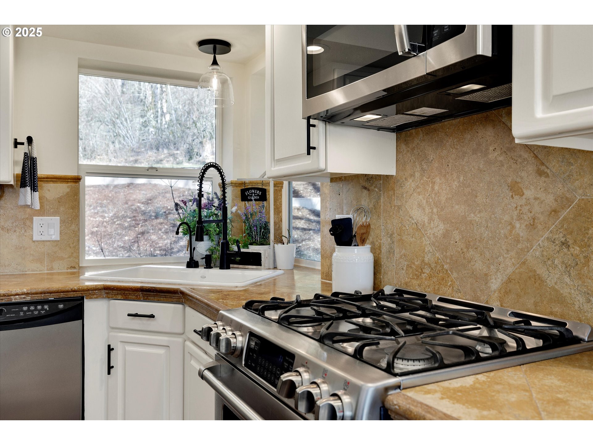 15451 Southeast Woodland Heights Road Amity, OR 97101 - Photo 13 of 48 a kitchen with a stove and a window