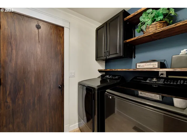 a kitchen with a stove and a microwave