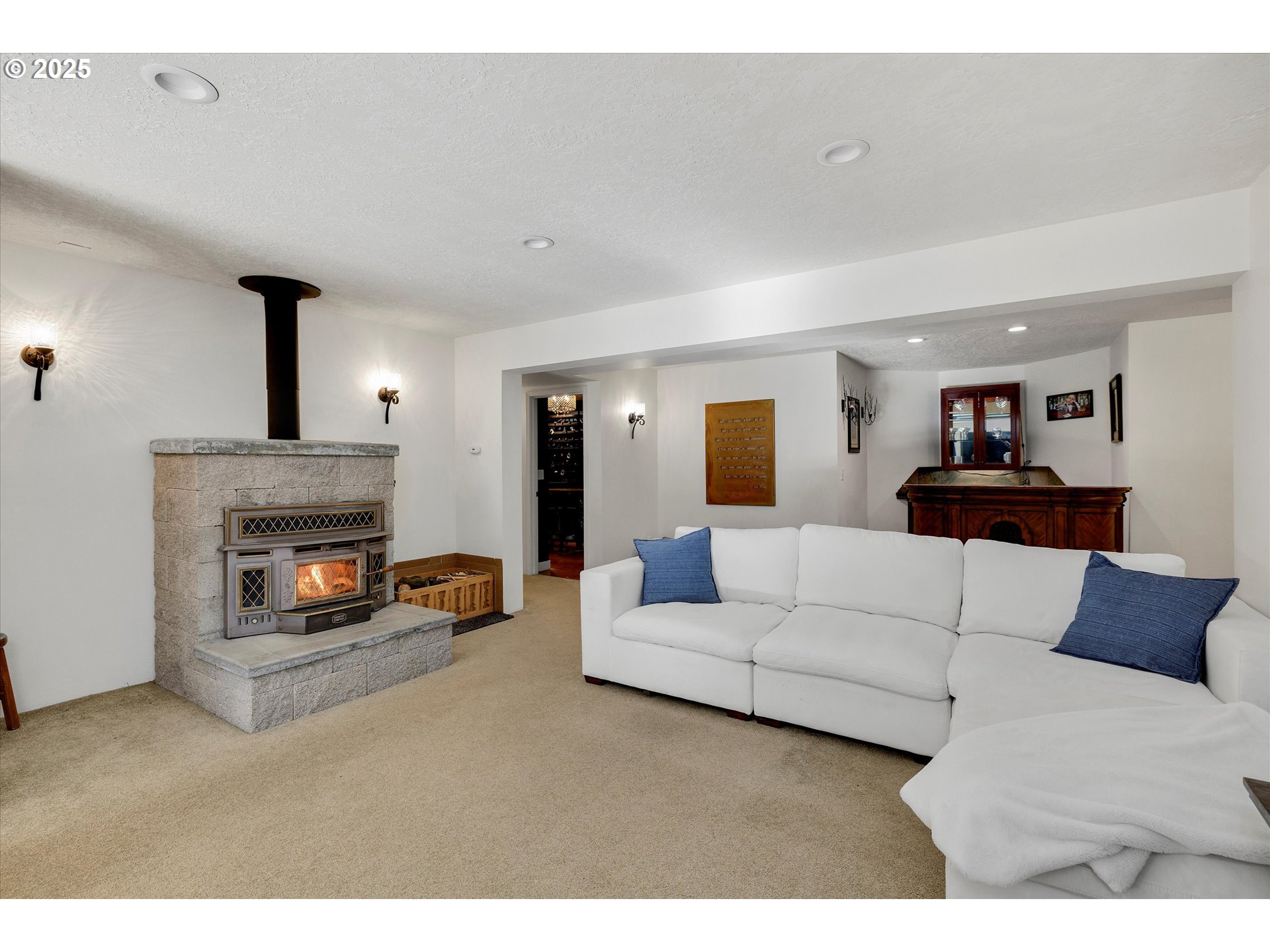 15451 Southeast Woodland Heights Road Amity, OR 97101 - Photo 22 of 48 a living room with furniture and a fireplace