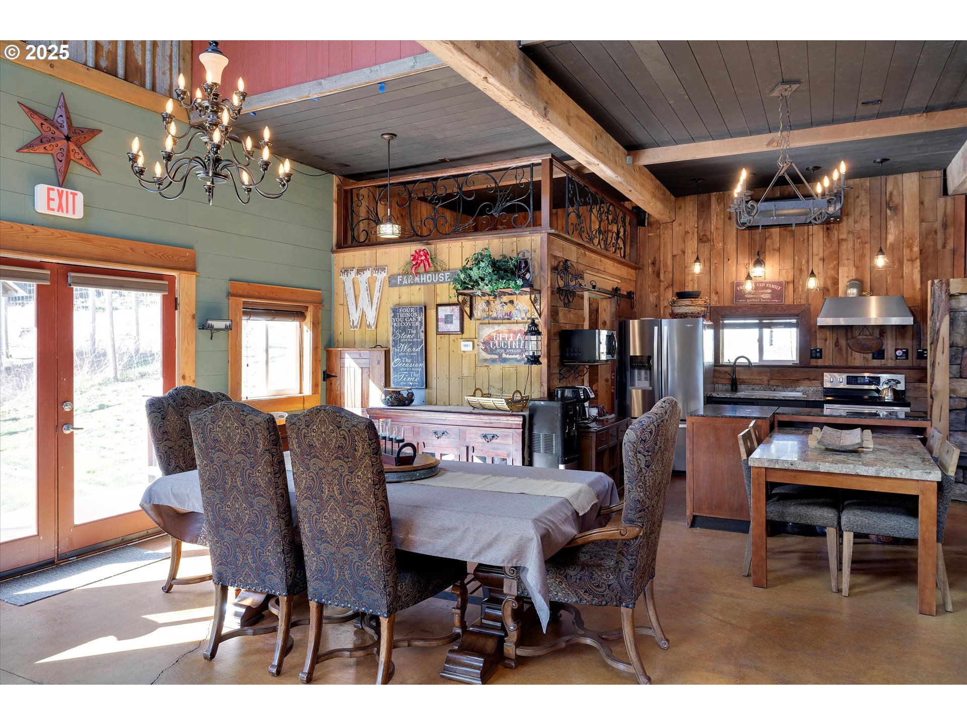 15451 Southeast Woodland Heights Road Amity, OR 97101 - Photo 35 of 48 a view of a dining room with furniture and chandelier