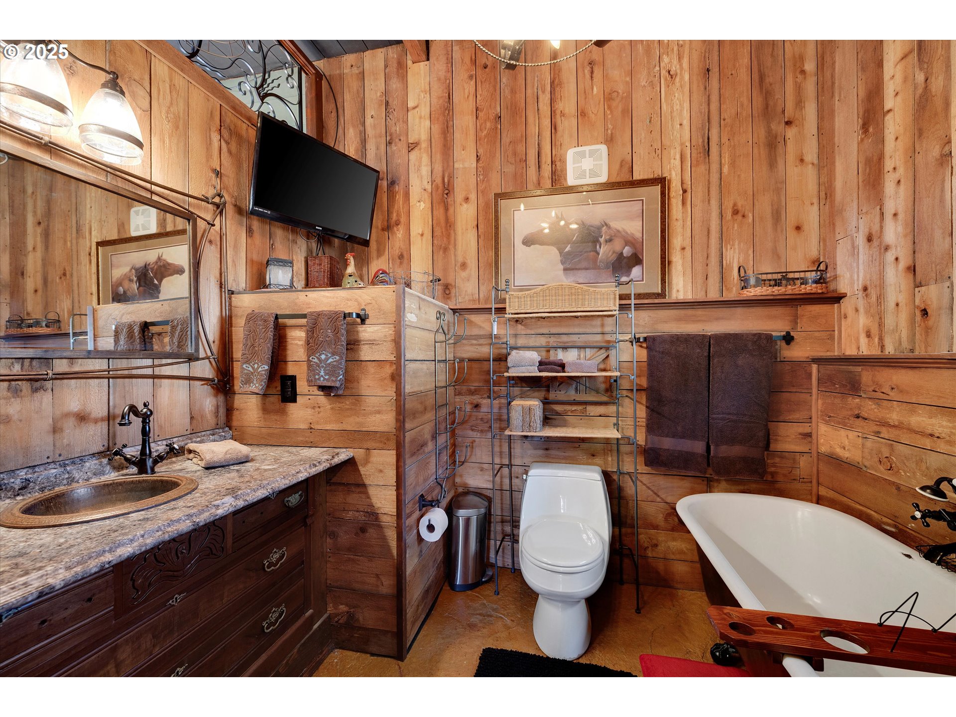 15451 Southeast Woodland Heights Road Amity, OR 97101 - Photo 37 of 48 a bathroom with a toilet a sink and mirror