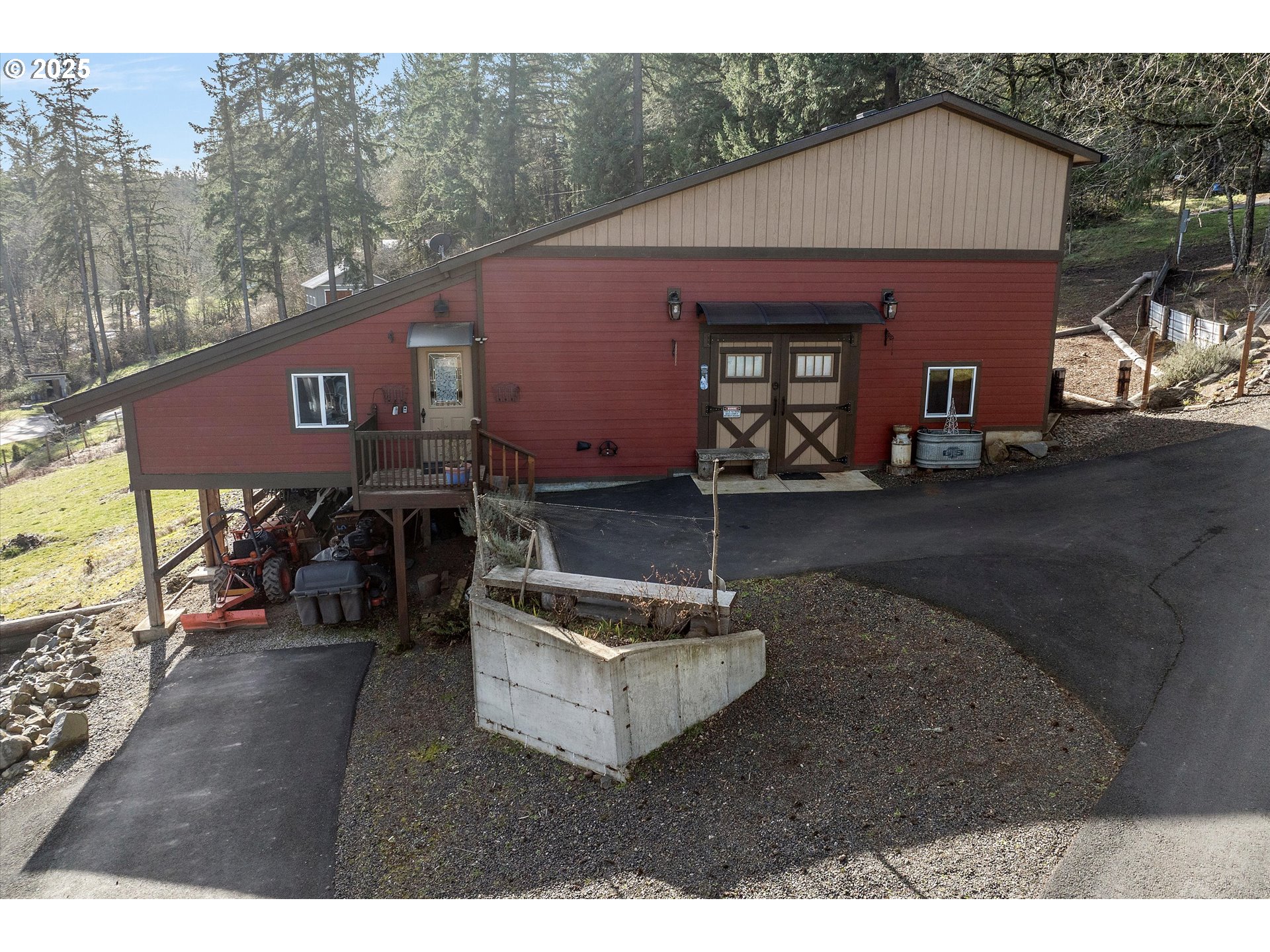 15451 Southeast Woodland Heights Road Amity, OR 97101 - Photo 38 of 48 a view of a house with a patio