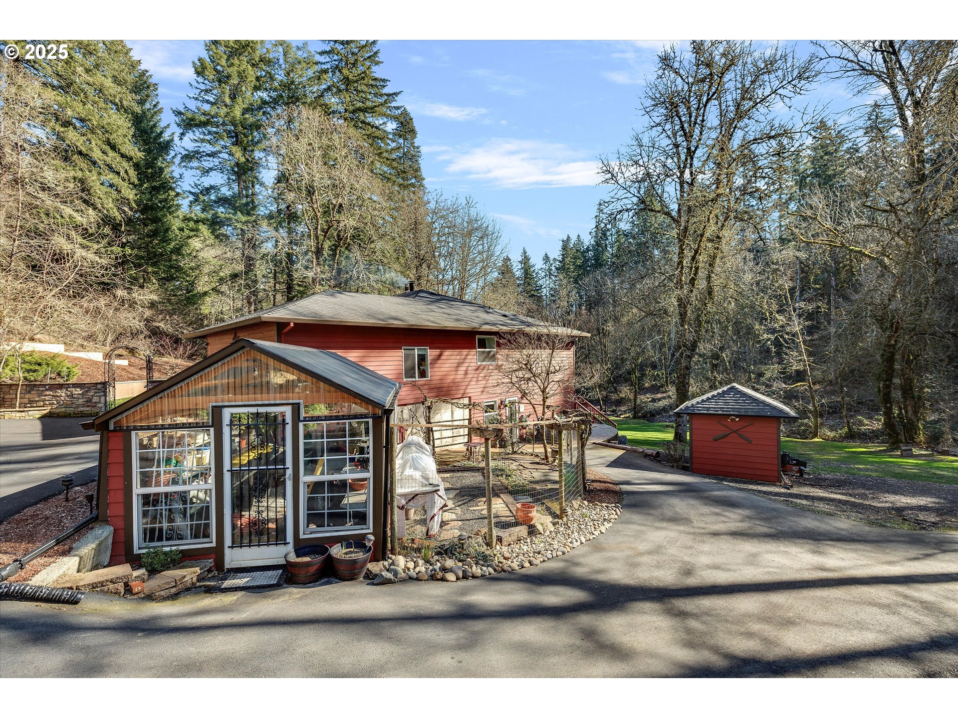15451 Southeast Woodland Heights Road Amity, OR 97101 - Photo 42 of 48 a front view of a house with garden