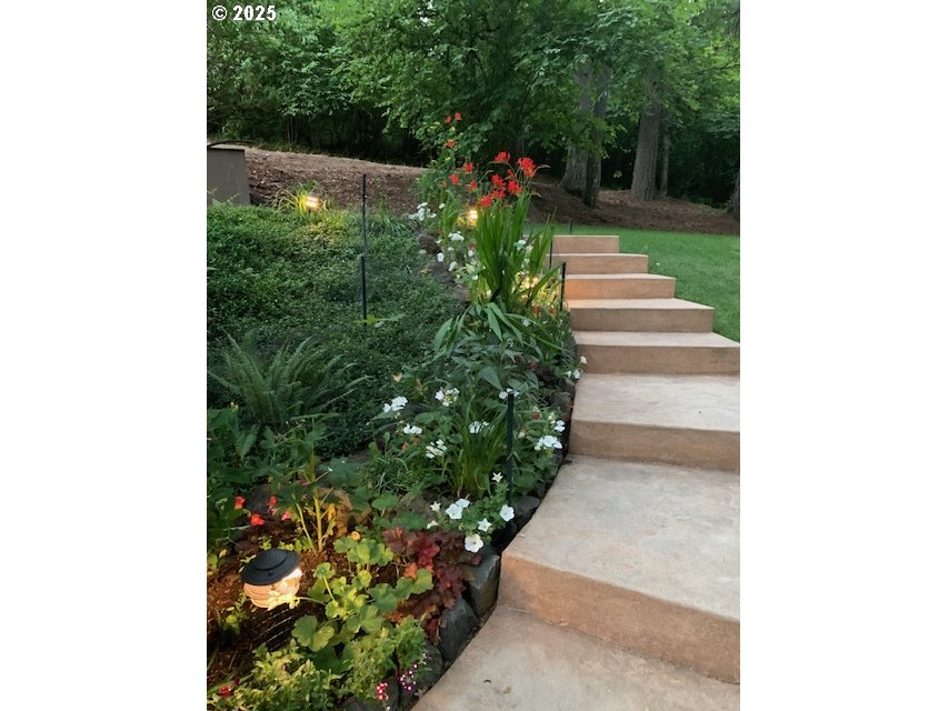 15451 Southeast Woodland Heights Road Amity, OR 97101 - Photo 48 of 48 a view of a garden with flowers