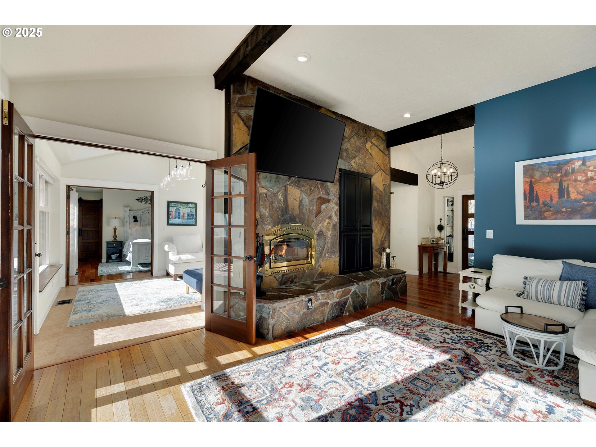 15451 Southeast Woodland Heights Road Amity, OR 97101 - Photo 9 of 48 a living room with a couch and a coffee table