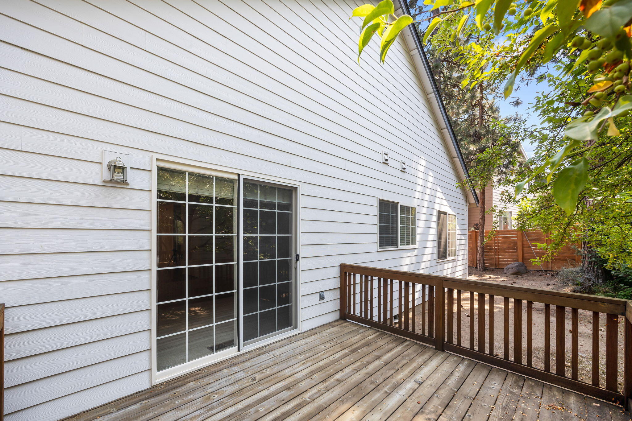 61311 Southwest Brookside Loop Bend, OR 97702 - Photo 28 of 30 Raised rear deck off family room.