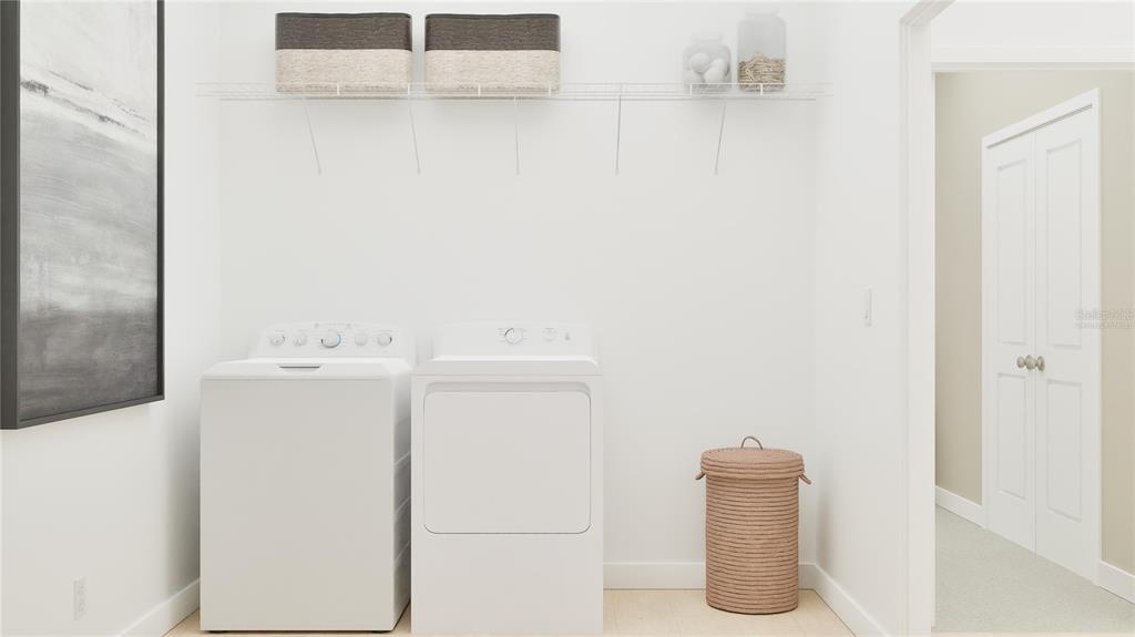 5653 Banyan Bay Road St. Cloud, FL 34771 - Photo 20 of 29 a utility room with dryer and washer