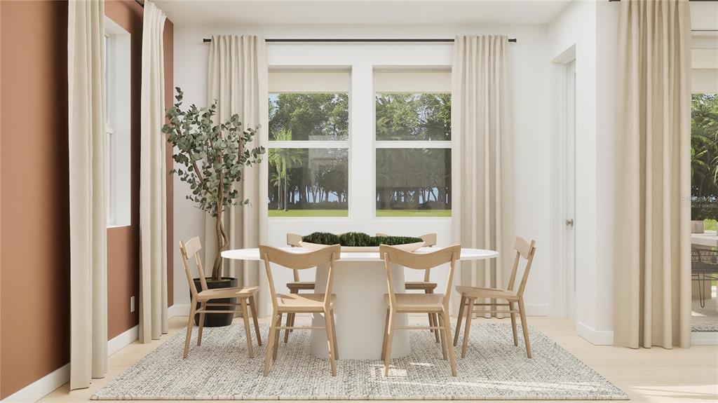 5653 Banyan Bay Road St. Cloud, FL 34771 - Photo 4 of 29 a view of a dining room with furniture and a window