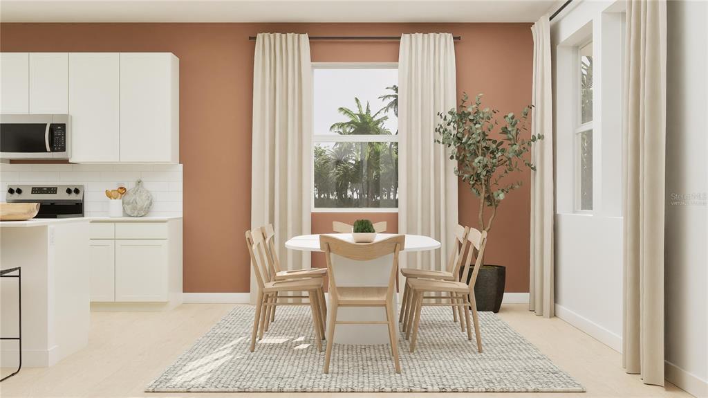 5653 Banyan Bay Road St. Cloud, FL 34771 - Photo 5 of 29 a dining room with furniture and window