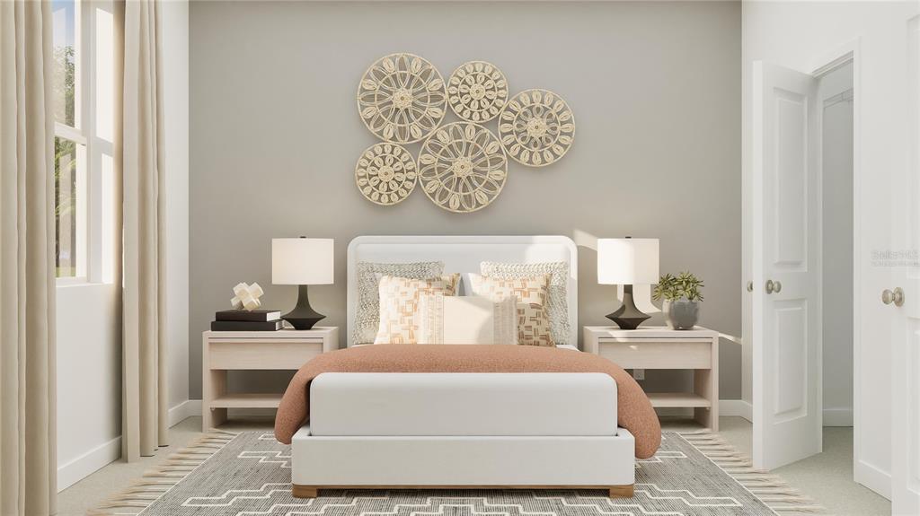 5653 Banyan Bay Road St. Cloud, FL 34771 - Photo 10 of 29 a bedroom with a large bed and a window