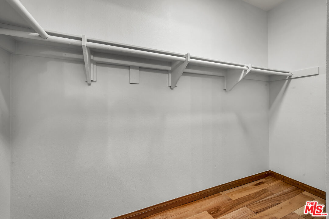 8162 Manitoba Street, Unit 202 Playa del Rey, CA 90293 - Photo 14 of 34 a view of a room with racks on the wall