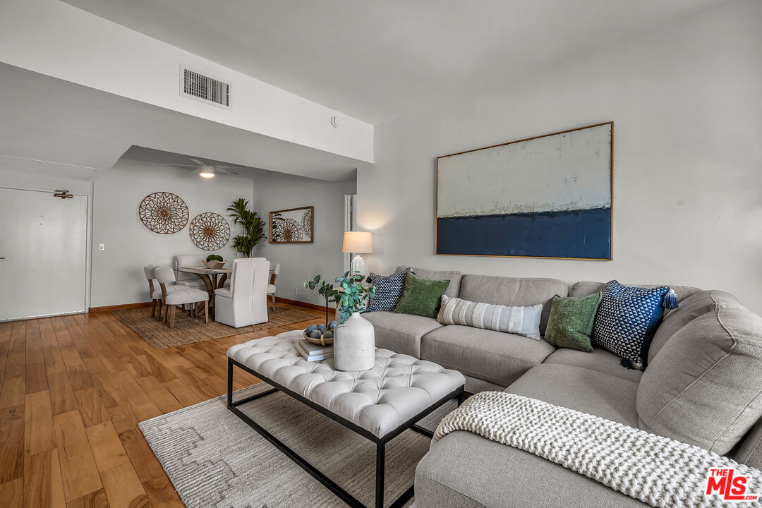 8162 Manitoba Street, Unit 202 Playa del Rey, CA 90293 - Photo 8 of 34 a living room with furniture and wooden floor