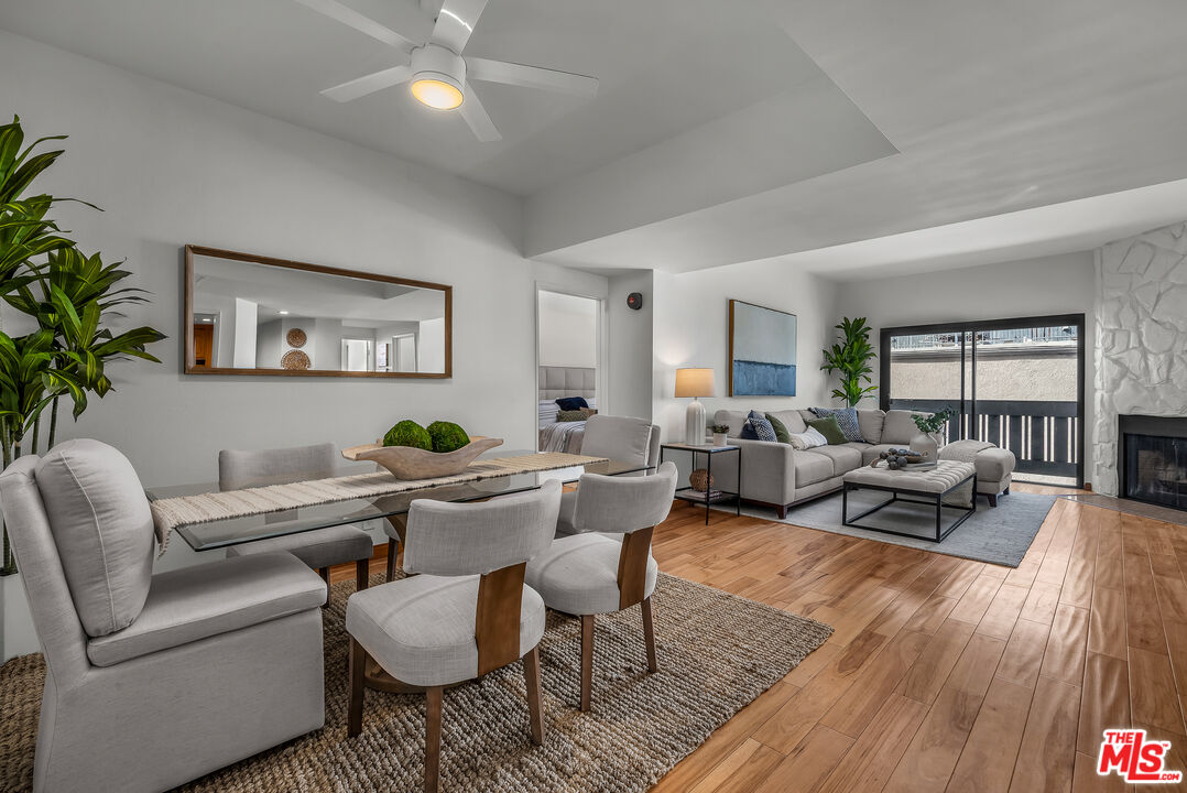 8162 Manitoba Street, Unit 202 Playa del Rey, CA 90293 - Photo 9 of 34 a living room with furniture and wooden floor