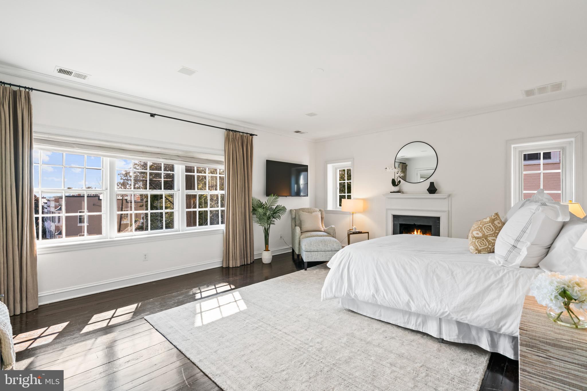 1698 32nd Street Northwest Washington, DC 20007 - Photo 15 of 29 a bedroom with a large bed and a window
