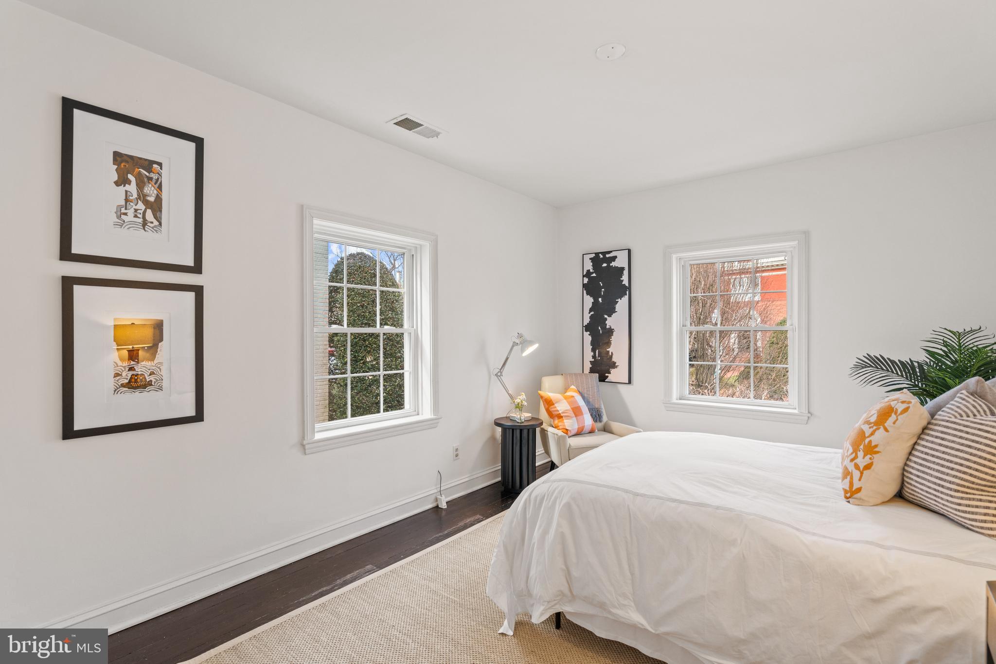 1698 32nd Street Northwest Washington, DC 20007 - Photo 18 of 29 a bedroom with a bed and a window