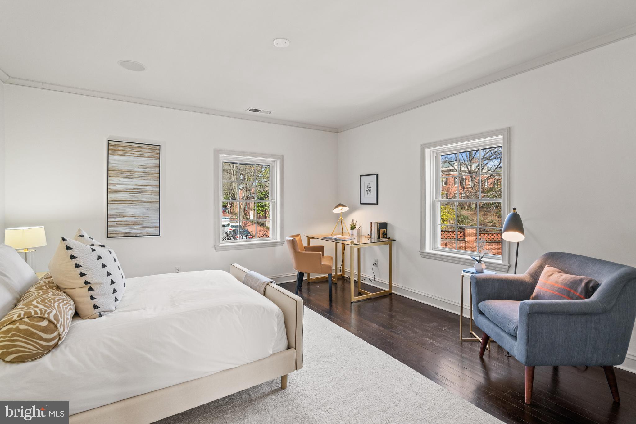 1698 32nd Street Northwest Washington, DC 20007 - Photo 19 of 29 a bedroom with a bed and wooden floor