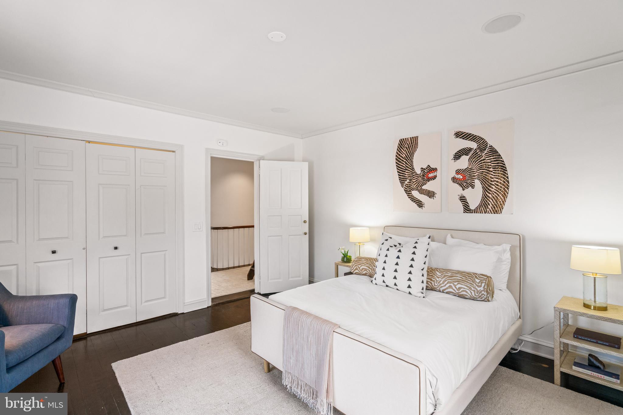 1698 32nd Street Northwest Washington, DC 20007 - Photo 20 of 29 a bedroom with a bed and a couch