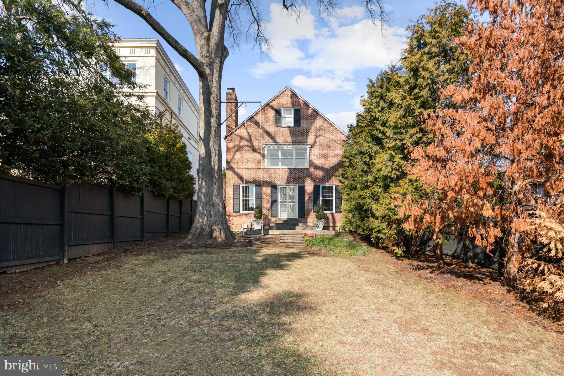 1698 32nd Street Northwest Washington, DC 20007 - Photo 28 of 29 a view of a yard with wooden fence
